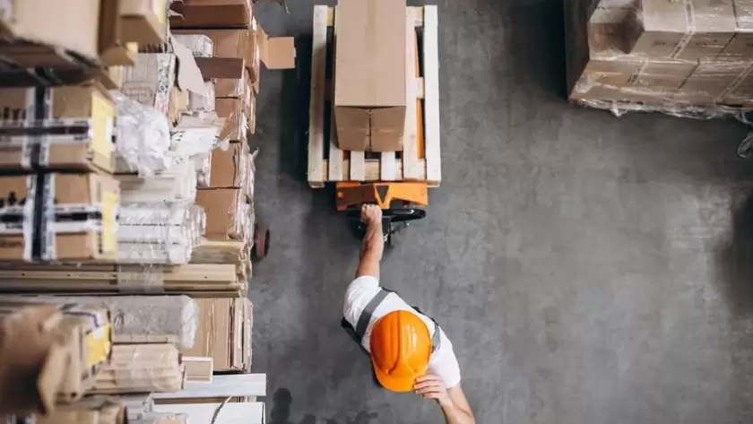 Young man working in Amazon Warehouse