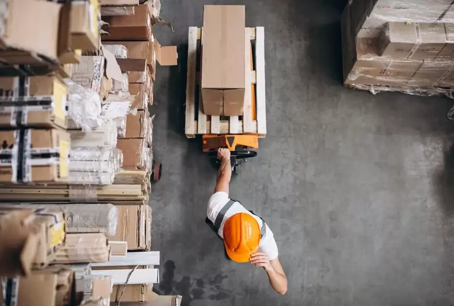 Young man working in Amazon Warehouse