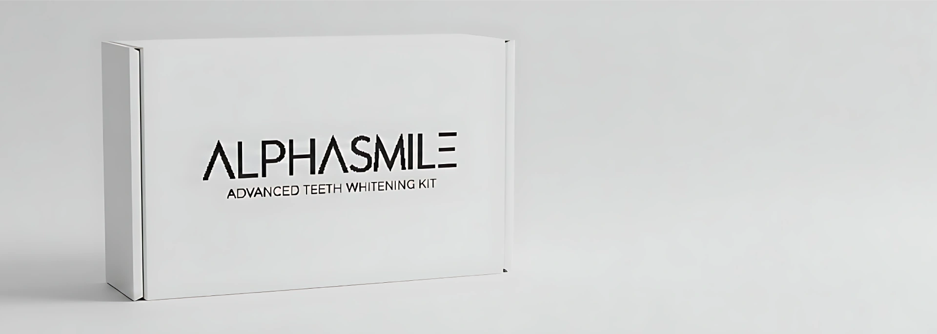Alpha Smile Advanced Teeth Whitening Kit box, white with black text, angled view on a light background.