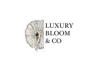 Logo for Luxury Bloom & Co, featuring a silver and white ornate floral half-mandala design next to the black text.